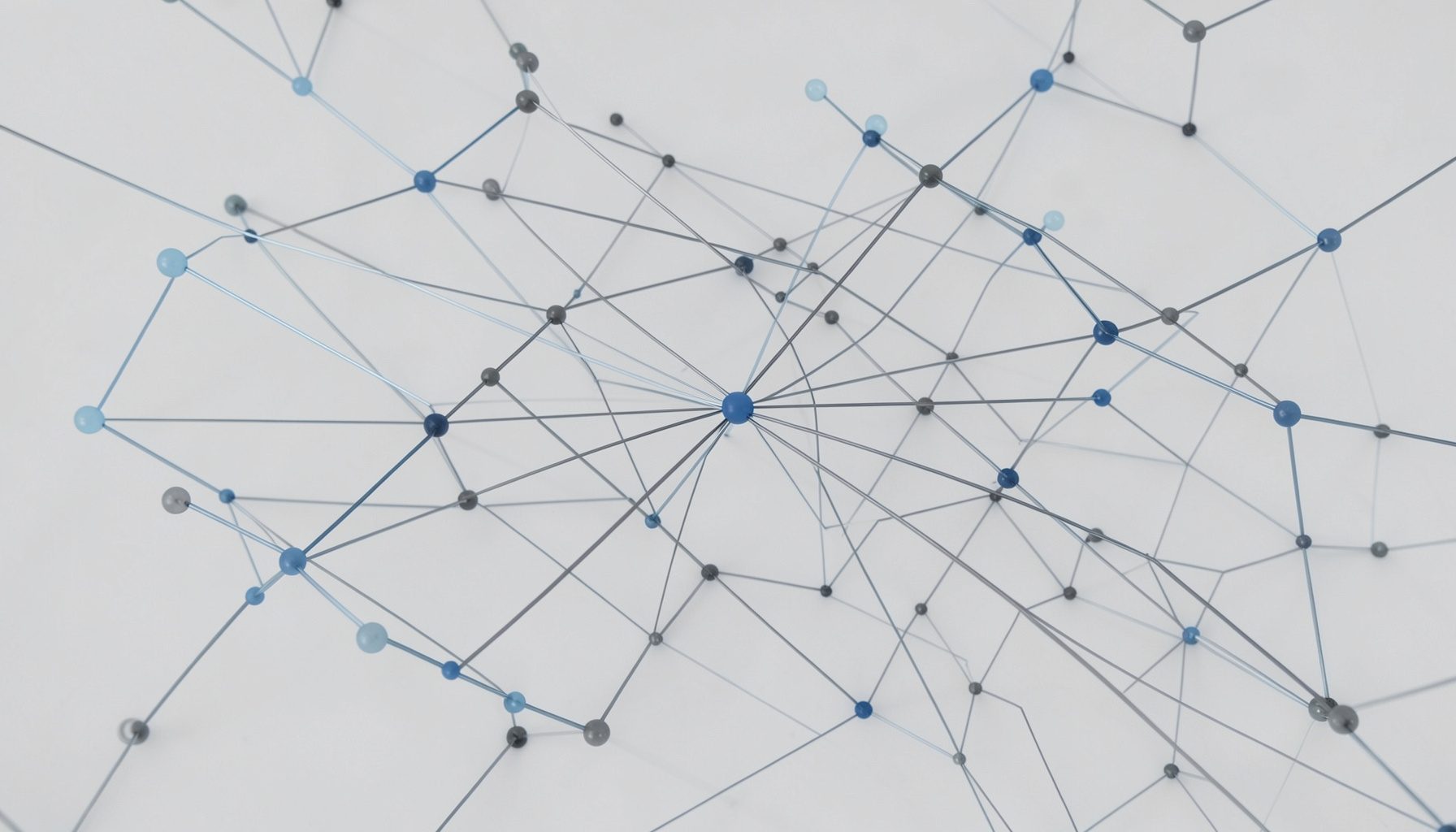 Abstract network nodes in muted blue and slate grey, connected by thin lines, suggesting connectivity and digital reach.