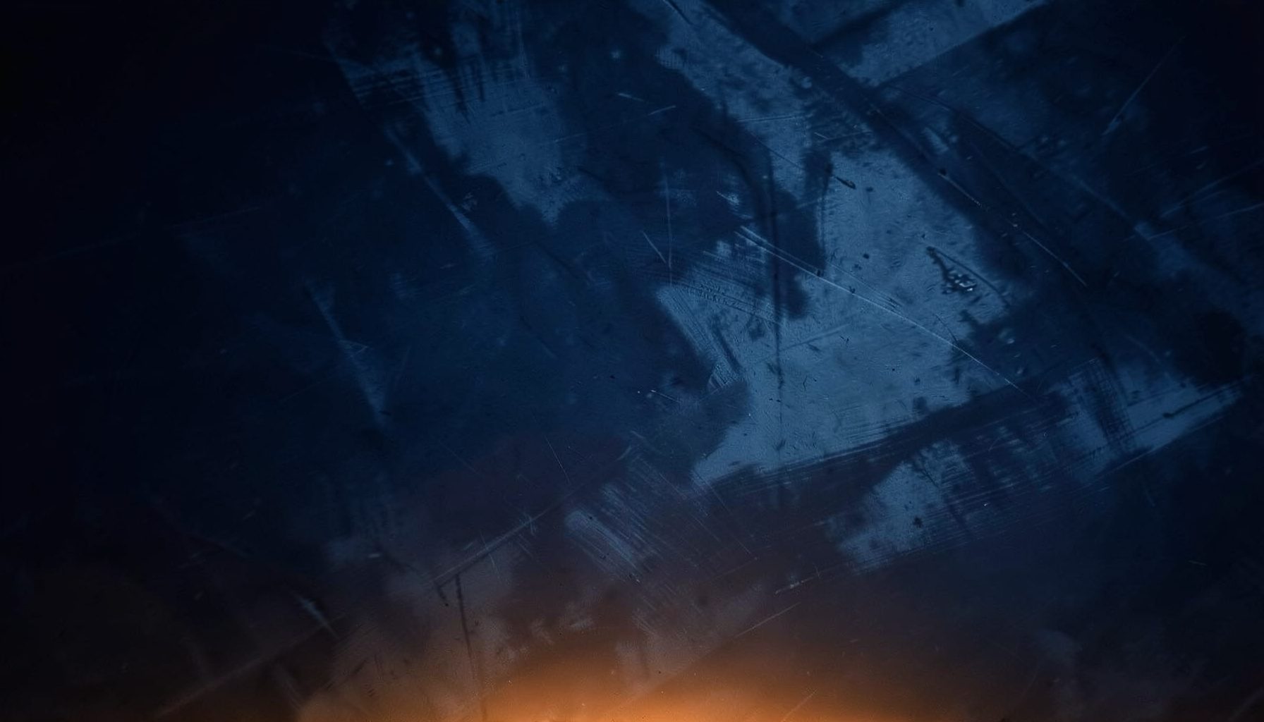 Wide banner with deep navy and muted steel-blue tones, an abstract industrial texture suggesting motion and energy, overlaid with a subtle warm orange accent glow near the lower edge.